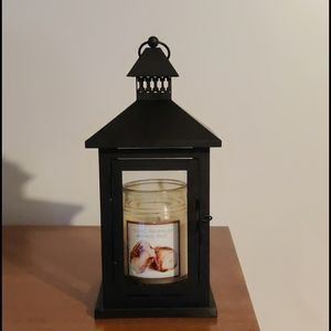 Candle holder with candle included.